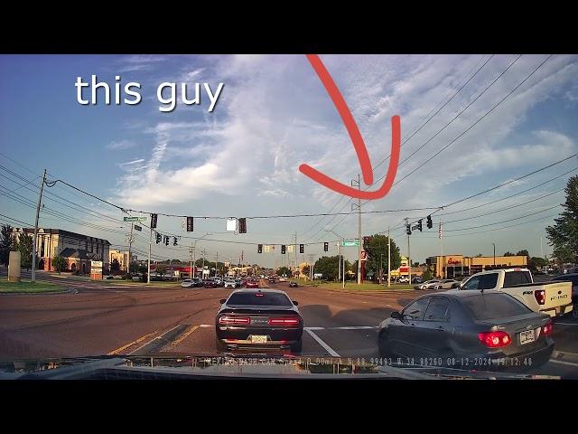 bad drivers on the road cutting of large truck with small car