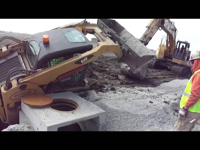 Stuck CAT skid Loader