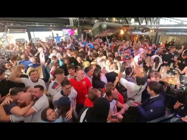 England fans go crazy after Saka goal  / England fans celebrate victory over Switzerland