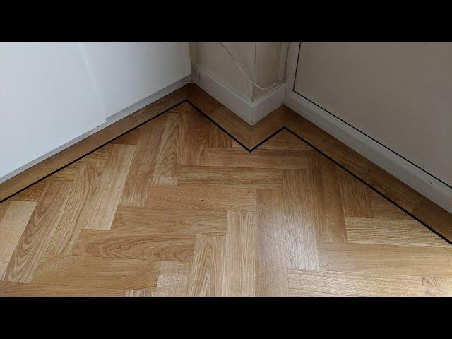 Featuring Herringbone Parquet Flooring with Border and Tramline | Fin Wood Ltd | Crafted for Life