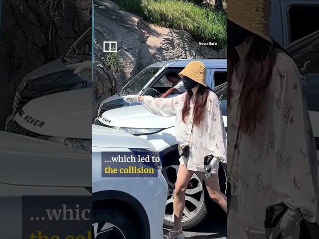 Angry woman assaults car driver after failing to cut into lane #shorts