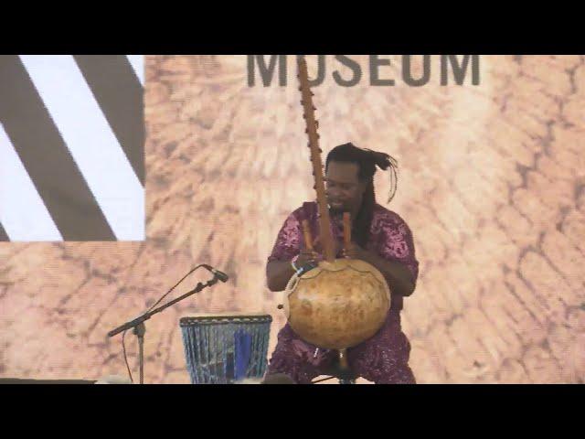 Amadou Kouyate performs at International African American Museum dedication ceremony