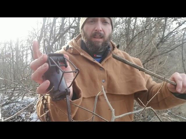 Setting a Dog Proof trap with a Trap Stake