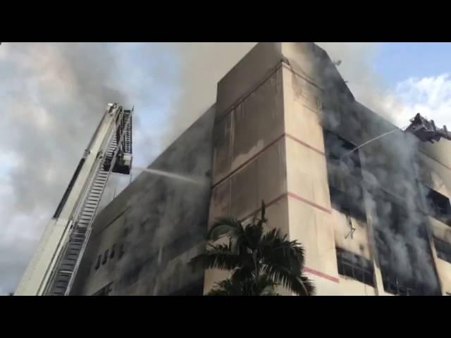 SCDF personnel at work at the C K Building fire