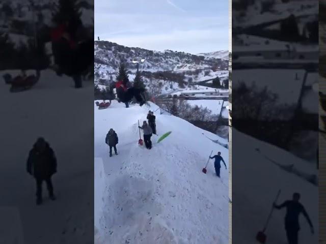 Guy Loses Sledge While Jumping Off Snow Ramp - 1134075