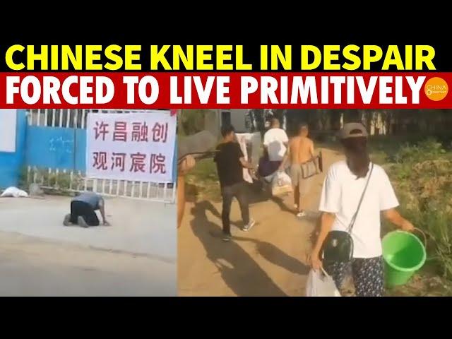 Chinese Head in Hands, Cry and Kneel Before Unfinished Buildings, Forced Into Primitive Living