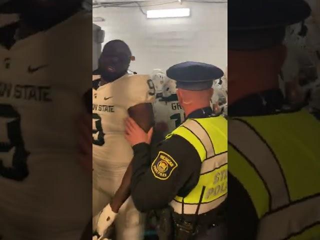 Michigan, Michigan State players fight in postgame tunnel