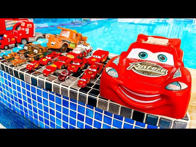 Disney Pixar Cars falling into deep pool, Lightning McQueen, Tow Mater, Mack, Sally, Francesco