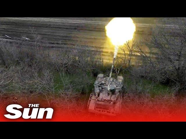 Russian T-90M tanks blast Ukrainian positions on the battlefield