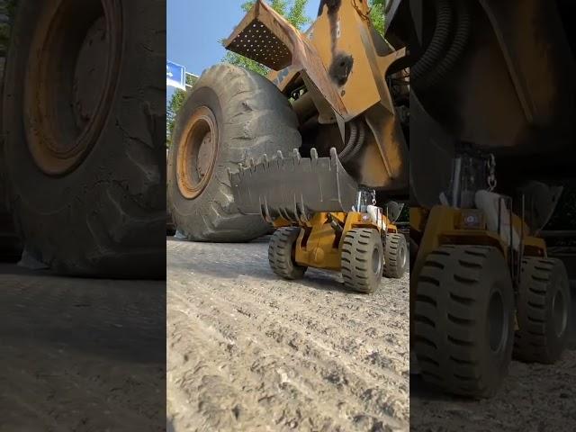 Small Bulldozer under the big Bulldozer