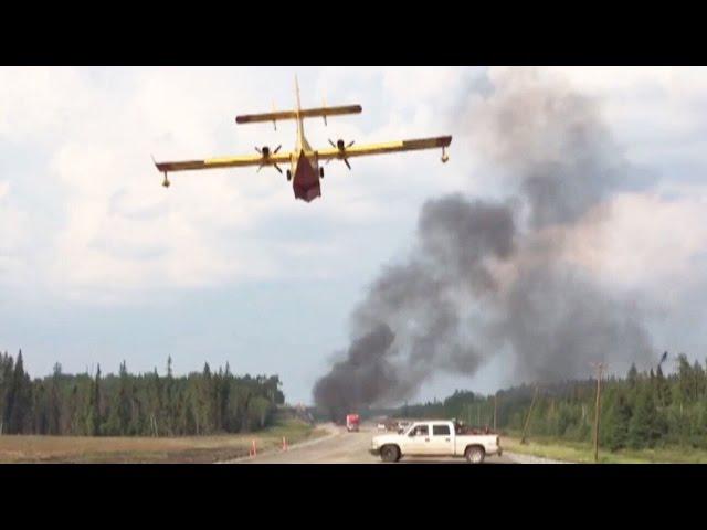 Caught on Cam: Water bomber tackles Manitoba highway blaze