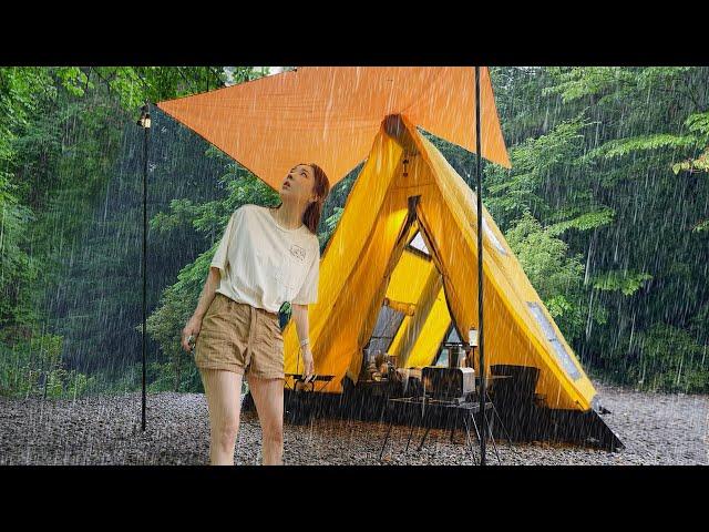 Solo camping in a mess in a leaky inflatable tent in heavy rain