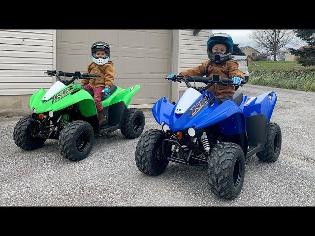 Our Kids get a HUGE SURPRISE! New Kawasaki KFX50 Four-Wheelers for Christmas!