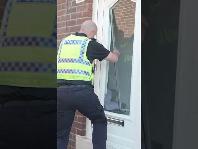 Police SMASH front door to arrest riot suspect