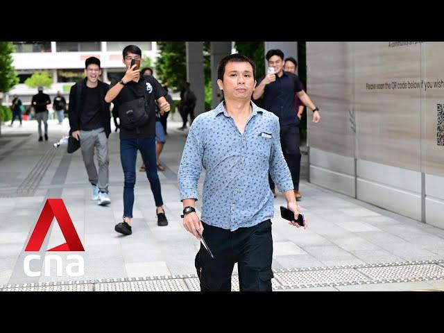 Kurt Tay heckled as he leaves the State Courts in Singapore