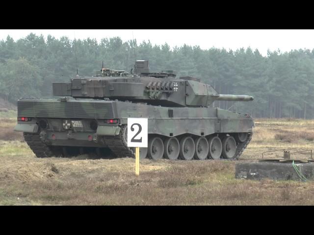 GERMAN LEOPARD 2A6 TANK SHOOTING AND DESTROYED A CAR