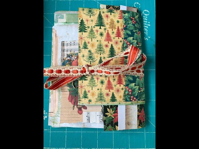 Using @CaraBrandonCreations  vintage Santa kit to create a folio out of envelopes