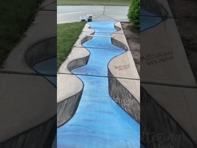 3D Chalk Art:  a river running through a canyon