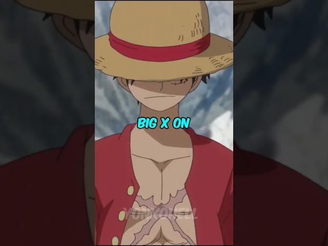 How did Luffy get the big X-shaped scar on his chest in One Piece?
