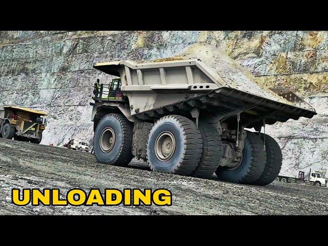 Unloading Hundreds of Tons of Cargo From Large Trucks at the Dump - Cat 797F & Cat 793F Haul Truck