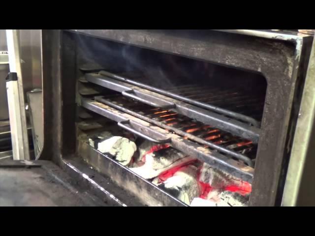 Cooking steak on the Josper at Blackwood's Bar & Grill at the Nira Caledonia