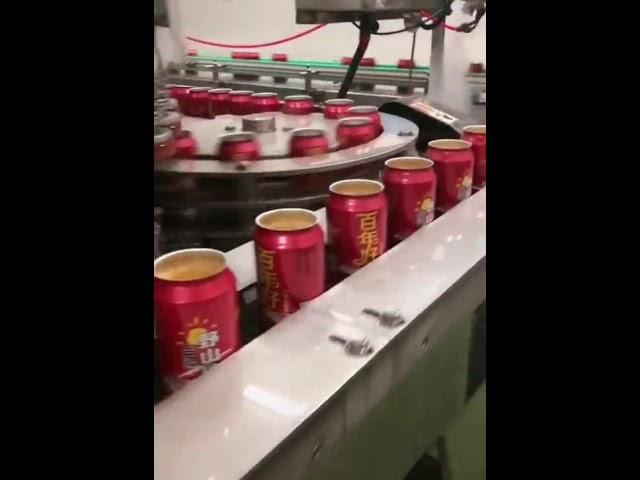 Automatic carbohydrate soft drink pop can filling and seaming machine