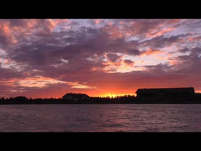 Sunset on the river bank / timelapse