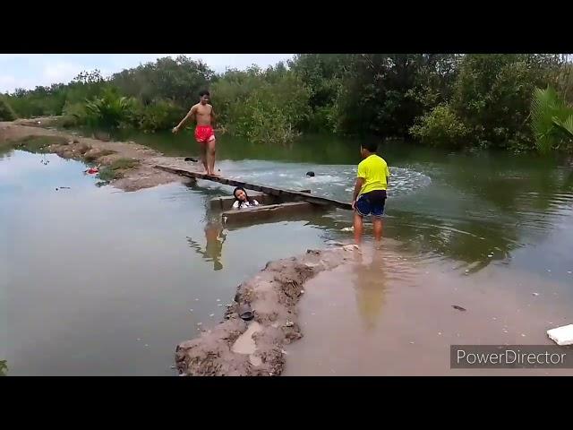 Visit my sister house with my two son (they are swimming at the fish pond.