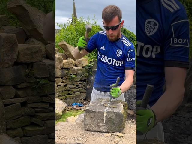 Splitting reclaimed stone into two pieces that can then be walled! ️