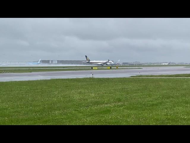 Airbus A350 takeoff on a wet runway