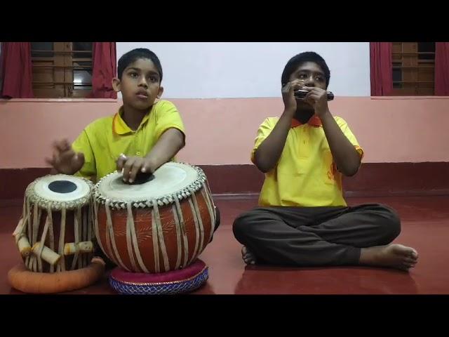 Mouth organ:  performed by students of Ramakrishna Mission Vidyalaya, Narendrapur