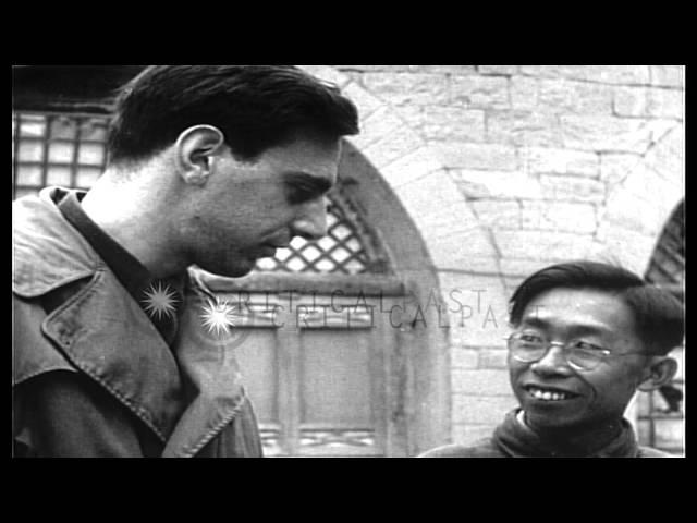 Mao Zedong at his cave house in Yan'an, China in 1944 with reporters HD Stock Footage