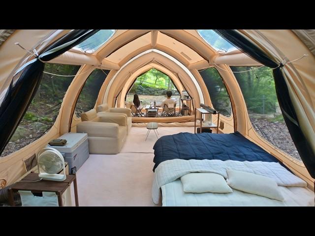 Long term tent setup with 2 bedrooms and 1 living room in the woods