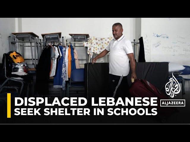 As Israel attacks, displaced Lebanese seek shelter in schools