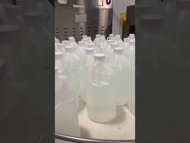 Watch How Half Gallon Jugs of Hand Sanitizer are Bottled and Processed