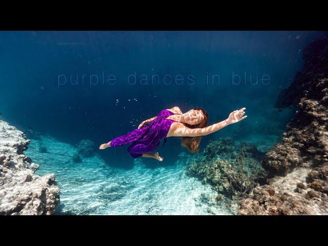 purple dances in blue