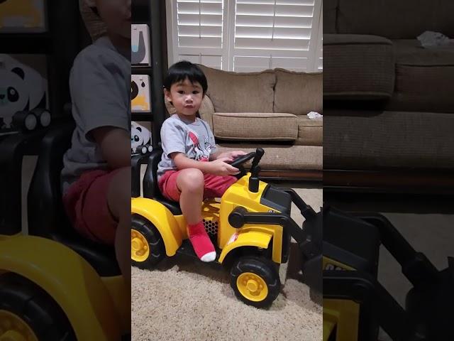 CAT Frontloader 6V Ride-On Toy by Kid Trax - a short demo. Toddler loves construction vehicle.