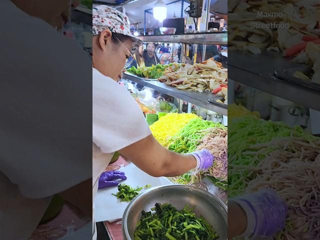 Auntie makes delicious colorful noodles. in Thailand #streetfood #Shorts