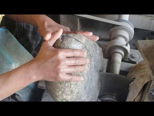 Cutting big Jade Jadeite Bolder searching for Green