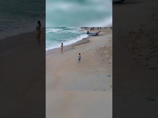 Boy running on the beach! Guess what country? answer at the end!