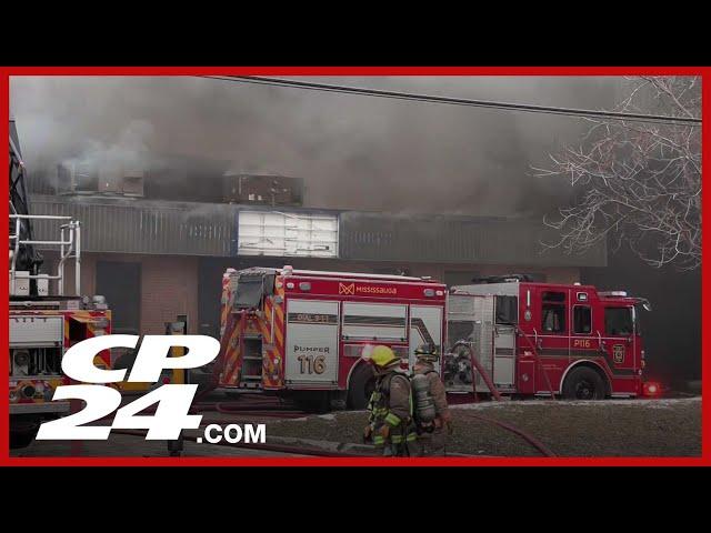 Crews are on scene of a massive industrial fire in Mississauga