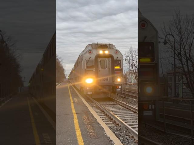 NJT 7029 cab car leads NJT 5742 with Mike (jingle bells a SAAHC & a sequence) at Dunellen,NJ!