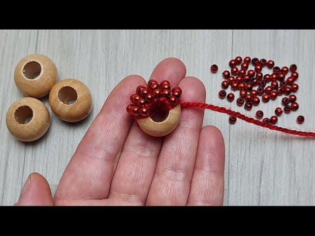 GREAT IDEAWOULD YOU LOOK AT WHAT I DID WITH WOODEN BEADS AND TINY BEADS.