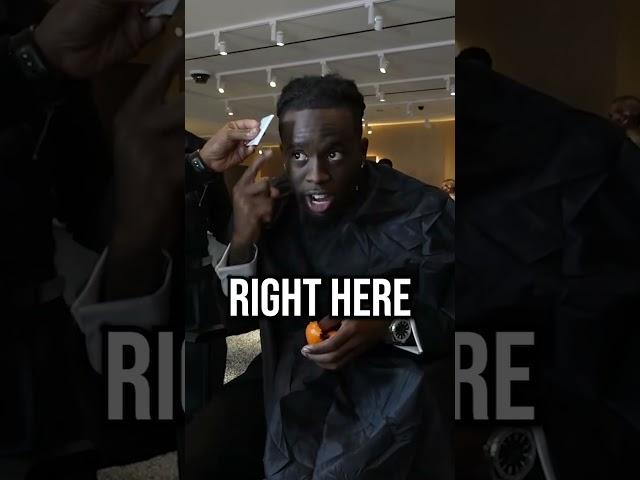 Kai Cenat Fixes His Hairline Right Before Presenting At AMA