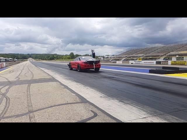 Slow Motion AWD Launch - 1.22 60 ft - 7.46 @ 199 MPH - Boostin Performance's Red Demon