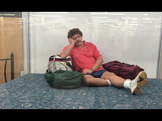 Orlando International Airport  Sculpture wax figure sleeping tourist The Traveler by Duane Hanson