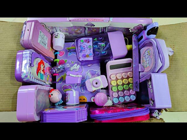 great purple collection of stationery, LED pencil box, calculator, sipper bottle, pencil sharpener