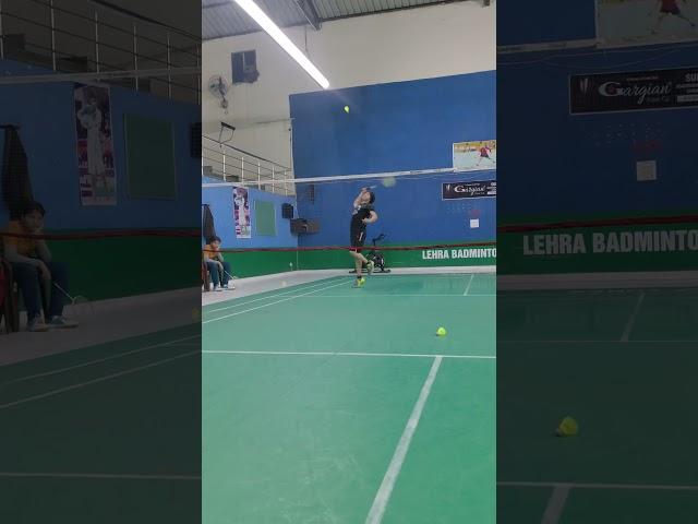 badminton smash headshot 