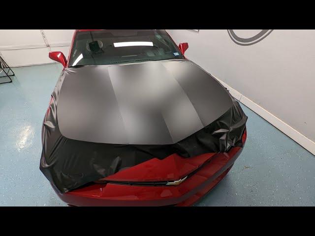 Before & after Camaro hood wrapped in Hexis Deep Black Satin vinyl wrap.