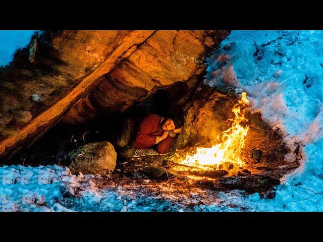 Surviving the Night Under a Rock in the Snow - no sleeping bag